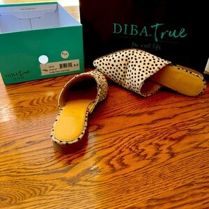 DibaTrue Pony hair clogs.